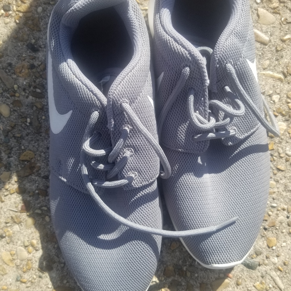 Grey and white Nike